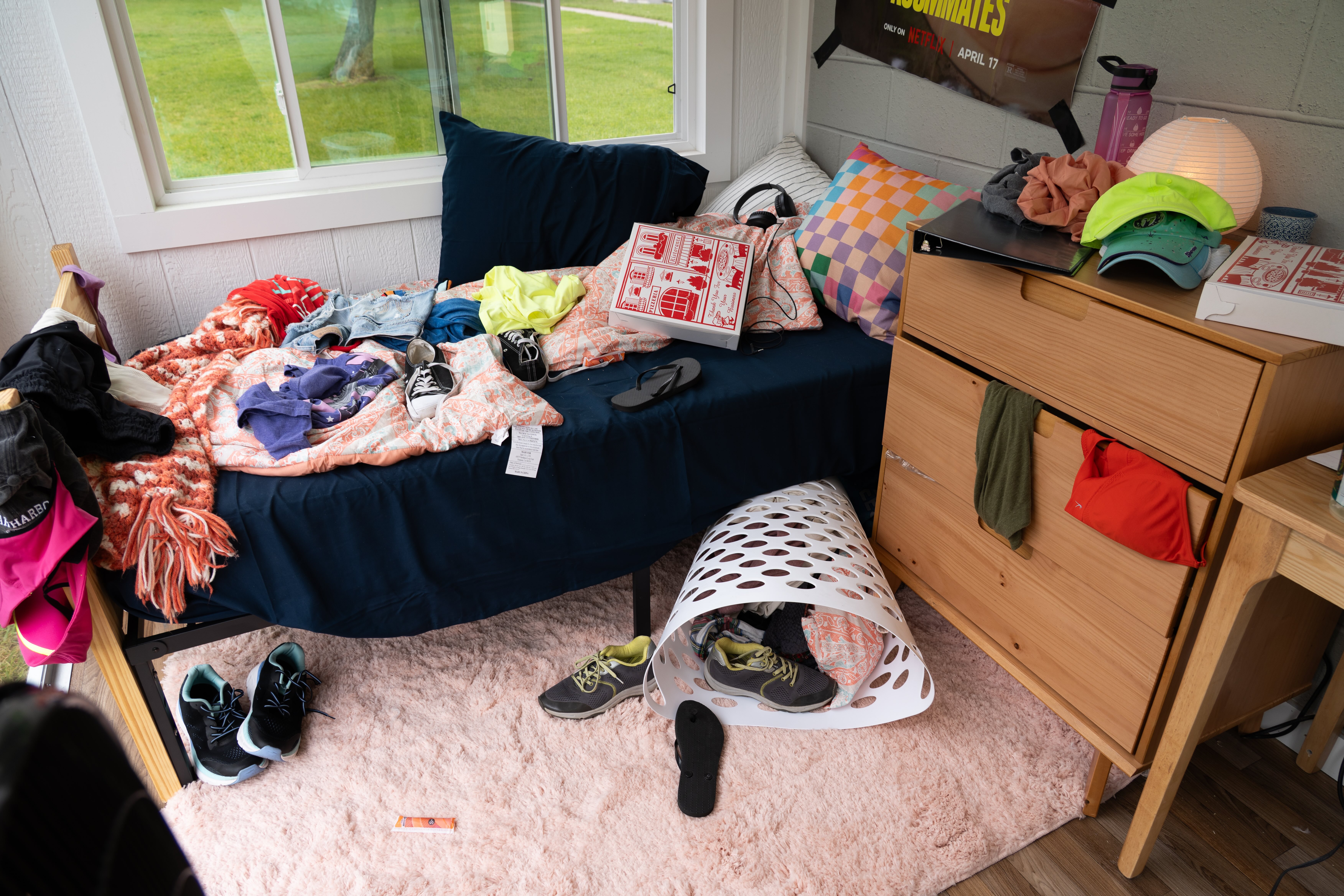Messy side of the dorm room